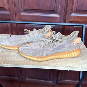 Adidas Yeezy Boost - Tan and Orange Sneakers
Adidas Boost